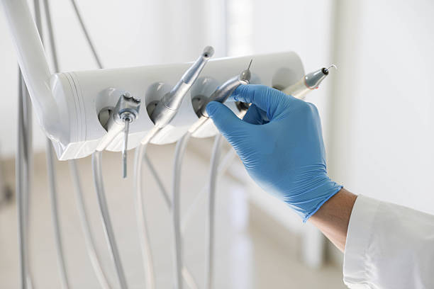 Professional Tooth Extraction technician working in Miramar, FL